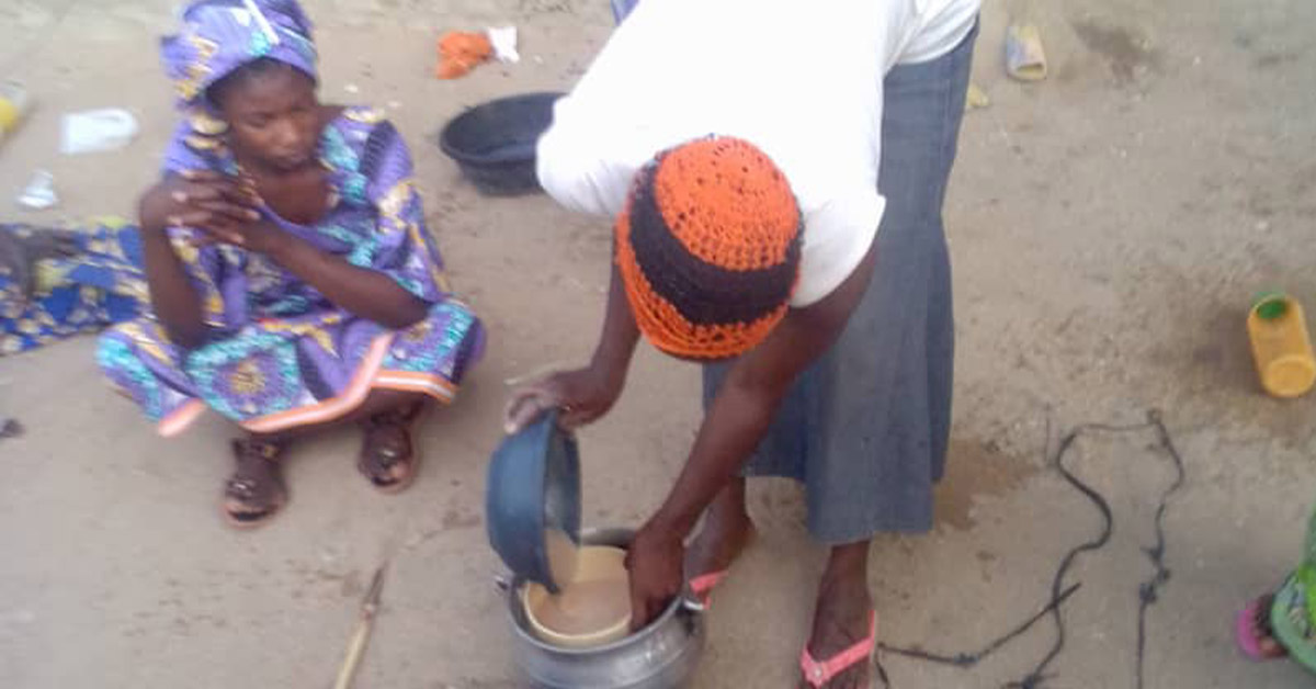 TCD worker, Sarah, preparing a nutritious porridge.