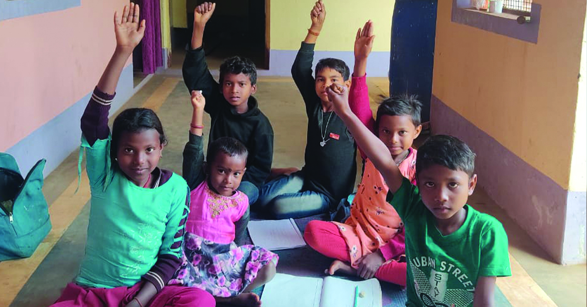 A group of children at the tutoring center of Shri Ambra